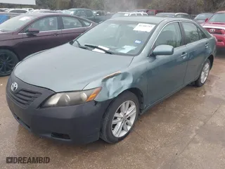 2007 Toyota Camry CE with VIN 4T1BE46K97U607748, listed as a IAAI auction lot 41566753 with 264,374 mi miles. Bid and sale history available at carsss.com. Image 2.