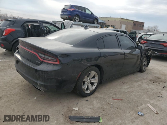 2015 Dodge Charger SXT z VIN 2C3CDXHG4FH844496, wystawiony jako Copart lot #86100084 z przebiegiem 110 090 mil mil oraz Szkoda całkowita • Salvage title. Historia ofert i sprzedaży dostępna na DreamBid. Obrazek 3.