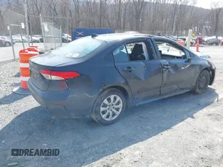 2023 Toyota Corolla LE with VIN 5YFB4MDE4PP079179, listed as a IAAI auction lot 41794330 with 60,410 mi miles. Bid and sale history available at carsss.com. Image 4.