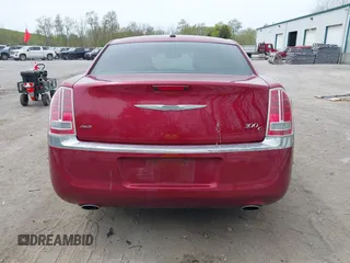 2012 Chrysler 300 C with VIN 2C3CCAKTXCH220185, listed as a IAAI auction lot 42110327 with 57,682 mi miles and . Bid and sale history available at DreamBid. Image 16.