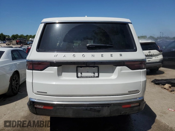 2023 Jeep Wagoneer Series III with VIN 1C4SJSDP3PS573384, listed as a Copart auction lot 58173364 with 5,014 mi miles and Salvage title. Bid and sale history available at DreamBid. Image 6.