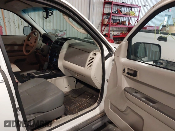 2011 Ford Escape XLS with VIN 1FMCU9C7XBKA40863, listed as a IAAI auction lot 42777301 with 219,848 mi miles and . Bid and sale history available at DreamBid. Image 5.
