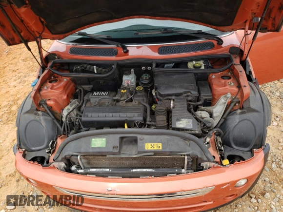 2006 MINI Convertible with VIN WMWRF335X6TF64910, listed as a Copart auction lot 60222215 with 85,761 mi miles and Salvage title. Bid and sale history available at DreamBid. Image 11.