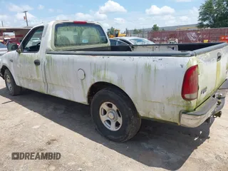 1998 Ford F-150 with VIN 1FTZF1724WKB57921, listed as a IAAI auction lot 42706692 with 213,913 mi miles and . Bid and sale history available at DreamBid. Image 3.