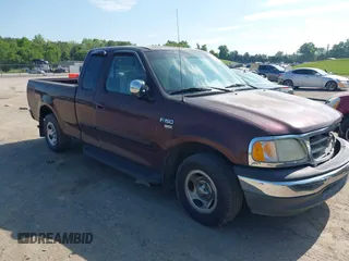 2001 Ford F-150 XL z VIN 1FTRX17W91NA84584, wystawiony jako IAAI lot #42122623 z przebiegiem Nie podano mil oraz . Historia ofert i sprzedaży dostępna na DreamBid. Obrazek 1.