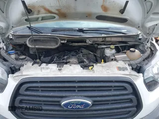 2018 Ford Transit with VIN 1FTYR1YGXJKA37398, listed as a IAAI auction lot 42073096 with 82,140 mi miles and . Bid and sale history available at DreamBid. Image 10.