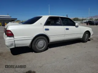 1996 Toyota Crown z VIN JZS1550042389, wystawiony jako Copart lot #68698234 z przebiegiem 117 283 mil mil oraz Szkoda całkowita • Salvage title. Historia ofert i sprzedaży dostępna na DreamBid. Obrazek 3.