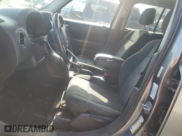 2014 Jeep Patriot Latitude with VIN 1C4NJPFA8ED618680, listed as a Copart auction lot 63998045 with 143,728 mi miles and Clean title. Bid and sale history available at DreamBid. Image 7.