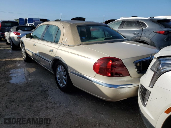 2002 Lincoln Continental with VIN 1LNHM97V32Y694132, listed as a Copart auction lot 76410144 with 0 mi miles and Non Repairable. Bid and sale history available at carsss.com. Image 2.