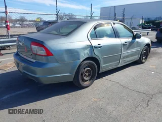 2006 Mercury Milan with VIN 3MEFM07Z56R638920, listed as a IAAI auction lot 41682035 with 212,844 mi miles and . Bid and sale history available at DreamBid. Image 4.