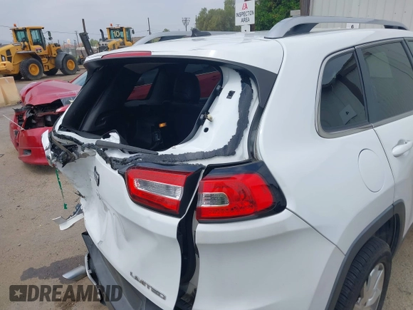2014 Jeep Cherokee Limited with VIN 1C4PJLDB2EW173127, listed as a IAAI auction lot 42413180 with 107,871 mi miles and . Bid and sale history available at DreamBid. Image 18.