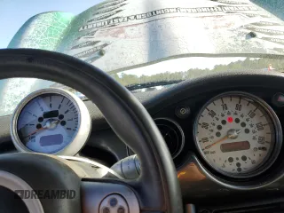 2006 MINI Convertible с VIN WMWRF33526TG16112, выставлен на аукционе Copart как лот 78717194 с пробегом 204 914 миль миль и Списание • Salvage title. История ставок и продаж доступна на DreamBid. Изображение 9.