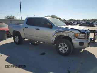 2020 GMC Canyon 2WD with VIN 1GTG5BEA2L1237021, listed as a Copart auction lot 76358214 with 77,815 mi miles and Salvage Title. Bid and sale history available at carsss.com. Image 4.
