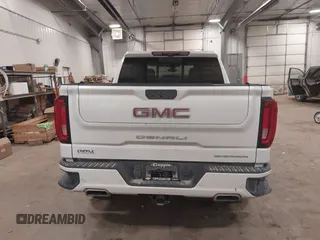 2020 GMC Sierra 1500 Denali z VIN 1GTU9FEL9LZ116486, wystawiony jako IAAI lot #41392384 z przebiegiem 61 283 mil mil oraz . Historia ofert i sprzedaży dostępna na DreamBid. Obrazek 16.