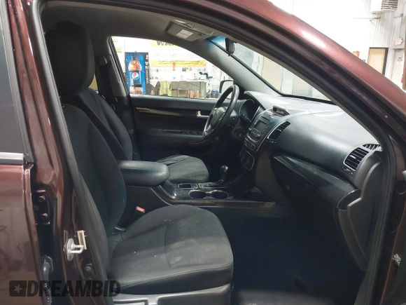 2015 Kia Sorento LX with VIN 5XYKTDA70FG646886, listed as a IAAI auction lot 42469491 with 214,232 mi miles and . Bid and sale history available at DreamBid. Image 5.
