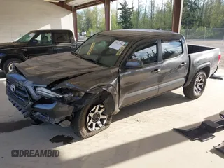 2017 Toyota Tacoma SR5 with VIN 3TMCZ5AN4HM088974, listed as a IAAI auction lot 42047358 with 153,743 mi miles and . Bid and sale history available at DreamBid. Image 2.