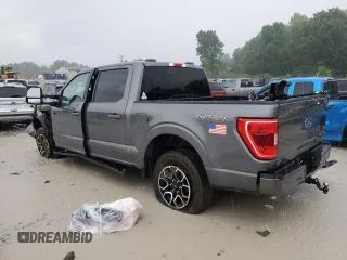 2023 Ford F-150 XL with VIN 1FTFW1E86PFA65505, listed as a Copart auction lot 60644385 with 6,959 mi miles and Salvage title. Bid and sale history available at DreamBid. Image 2.