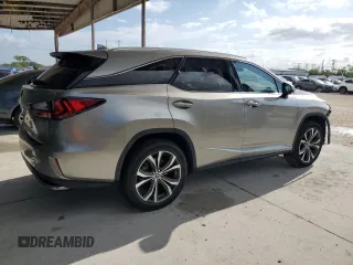 2020 Lexus RX 350L with VIN JTJHZKEA1L2015764, listed as a Copart auction lot 58324465 with 54,860 mi miles and Salvage title. Bid and sale history available at DreamBid. Image 3.