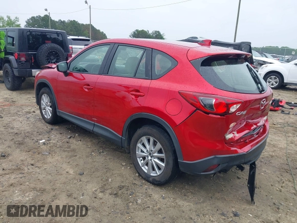 2015 Mazda CX-5 Sport with VIN JM3KE2BE5F0484326, listed as a IAAI auction lot 42186263 with 192,118 mi miles and . Bid and sale history available at DreamBid. Image 3.
