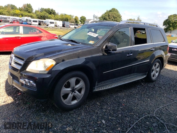 2011 Mercedes-Benz GL-Class GL 450 with VIN 4JGBF7BEXBA660757, listed as a Copart auction lot 69501904 with 150,468 mi miles and Salvage Title. Bid and sale history available at carsss.com. Image 1.