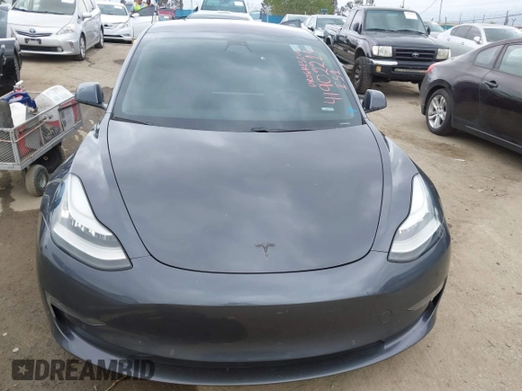 2018 Tesla Model 3 Long Range Battery with VIN 5YJ3E1EA0JF101564, listed as a IAAI auction lot 41902214 with 101,581 mi miles. Bid and sale history available at carsss.com. Image 12.