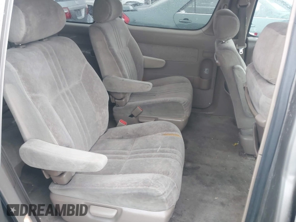 1999 Toyota Sienna LE with VIN 4T3ZF13C9XU164032, listed as a IAAI auction lot 41916673 with 296,628 mi miles and . Bid and sale history available at DreamBid. Image 8.