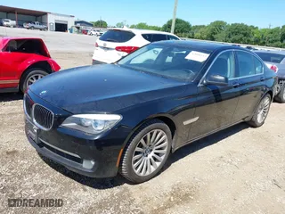 2012 BMW 7 Series 750i with VIN WBAKA8C50CCY37892, listed as a IAAI auction lot 42080313 with 148,058 mi miles. Bid and sale history available at carsss.com. Image 2.