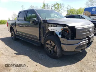 2022 Ford F-150 Lightning Pro z VIN 1FT6W1EV7NWG10033, wystawiony jako Copart lot #55569895 z przebiegiem 11 282 mil mil oraz Szkody całkowita. Historia ofert i sprzedaży dostępna na DreamBid. Obrazek 4.