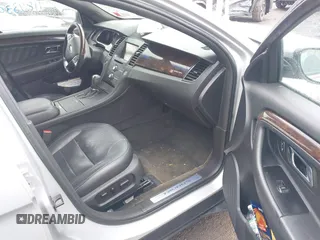 2014 Ford Taurus Limited with VIN 1FAHP2F81EG123933, listed as a IAAI auction lot 41843301 with 111,629 mi miles. Bid and sale history available at carsss.com. Image 5.