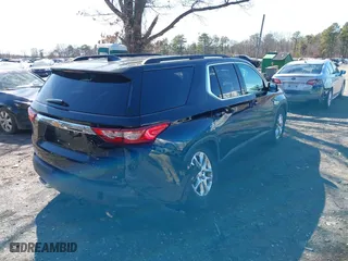 2019 Chevrolet Traverse LT Cloth with VIN 1GNEVGKW3KJ100518, listed as a IAAI auction lot 41812246 with 78,738 mi miles. Bid and sale history available at carsss.com. Image 4.