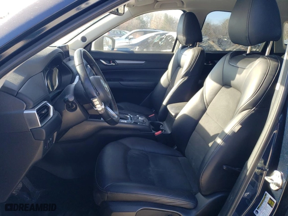 2019 Mazda CX-5 Touring with VIN JM3KFBCM4K0518219, listed as a Copart auction lot 86881674 with 57,165 mi miles and Salvage Title. Bid and sale history available at carsss.com. Image 7.