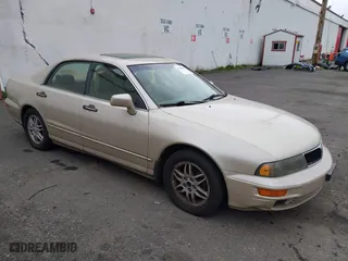 2000 Mitsubishi Diamante LS with VIN 6MMAP67P7YT005234, listed as a IAAI auction lot 41896098 with 131,852 mi miles. Bid and sale history available at carsss.com. Image 1.