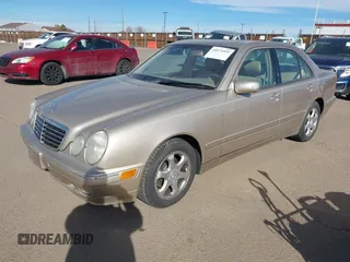 2002 Mercedes-Benz E-Class with VIN WDBJF65J92B479841, listed as a IAAI auction lot 41471955 with 203,527 mi miles. Bid and sale history available at carsss.com. Image 2.