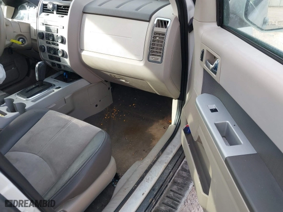 2010 Mercury Mariner Premier with VIN 4M2CN8HG3AKJ15125, listed as a IAAI auction lot 41440858 with 1 mi miles. Bid and sale history available at carsss.com. Image 5.