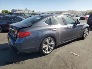2011 Infiniti M with VIN JN1BY1AP3BM325629, listed as a Copart auction lot 58600135 with 132,635 mi miles and Salvage title. Bid and sale history available at DreamBid. Image 3.