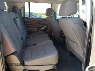 2019 Chevrolet Suburban LS with VIN 1GNSCGKC6KR180042, listed as a Copart auction lot 76829394 with 75,574 mi miles and Salvage title. Bid and sale history available at DreamBid. Image 11.