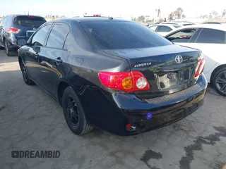 2009 Toyota Corolla with VIN 1NXBU40E19Z128054, listed as a IAAI auction lot 42085620 with 109,702 mi miles. Bid and sale history available at carsss.com. Image 3.