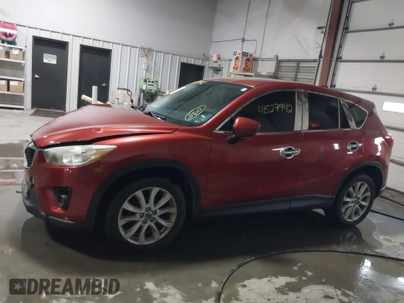 2013 Mazda CX-5 Grand Touring with VIN JM3KE2DE3D0120609, listed as a IAAI auction lot 41527942 with 215,176 mi miles. Bid and sale history available at carsss.com. Image 14.