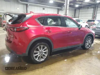 2020 Mazda CX-5 Grand Touring with VIN JM3KFBDM2L1771632, listed as a Copart auction lot 52894945 with 34,926 mi miles and Salvage Title. Bid and sale history available at carsss.com. Image 3.