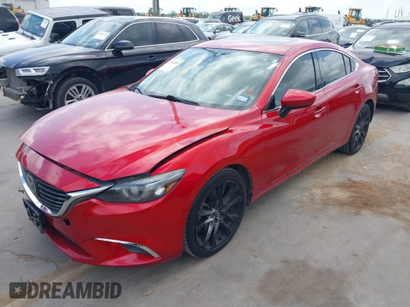2016 Mazda 6 i Grand Touring z VIN JM1GJ1W58G1486694, wystawiony jako IAAI lot #42094443 z przebiegiem 77 803 mil mil oraz . Historia ofert i sprzedaży dostępna na DreamBid. Obrazek 17.