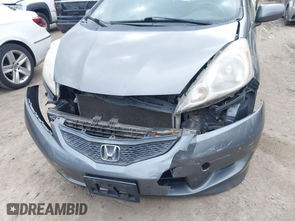 2011 Honda Fit Sport z VIN JHMGE8H53BS004872, wystawiony jako IAAI lot #42290323 z przebiegiem 145 685 mil mil oraz . Historia ofert i sprzedaży dostępna na DreamBid. Obrazek 6.