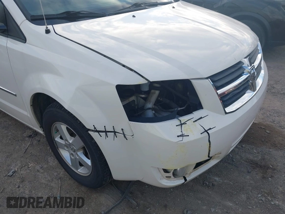 2010 Dodge Grand Caravan SXT with VIN 2D4RN5D17AR444818, listed as a IAAI auction lot 40941591 with Not Provided miles and . Bid and sale history available at DreamBid. Image 6.