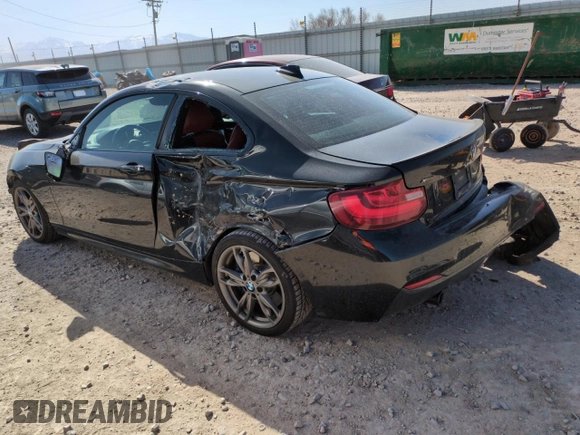 2015 BMW 2 Series M235i xDrive with VIN WBA1J9C5XFV371057, listed as a Copart auction lot 51994765 with 189,788 mi miles and Salvage Title. Bid and sale history available at carsss.com. Image 2.