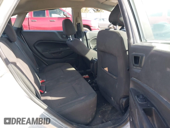 2018 Ford Fiesta SE with VIN 3FADP4BJ4JM134833, listed as a IAAI auction lot 41924079 with 76,781 mi miles and . Bid and sale history available at DreamBid. Image 8.