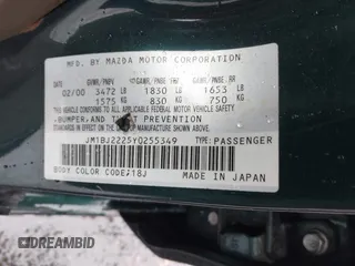 2000 Mazda Protege DX with VIN JM1BJ2225Y0255349, listed as a IAAI auction lot 41604895 with Not Provided miles and . Bid and sale history available at DreamBid. Image 9.