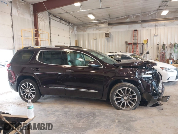 2021 GMC Acadia Denali with VIN 1GKKNXLS2MZ140119, listed as a IAAI auction lot 42553557 with 50,197 mi miles and . Bid and sale history available at DreamBid. Image 13.