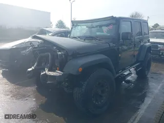 2012 Jeep Wrangler Unlimited Sport with VIN 1C4BJWDG6CL266948, listed as a IAAI auction lot 41801025 with 124,428 mi miles. Bid and sale history available at carsss.com. Image 17.