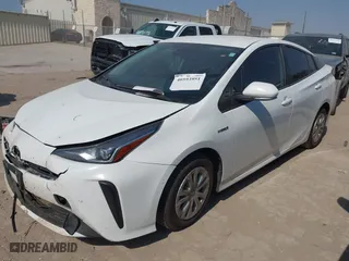 2021 Toyota Prius L Eco with VIN JTDKAMFU6M3141263, listed as a IAAI auction lot 40593951 with 95,921 mi miles. Bid and sale history available at carsss.com. Image 2.