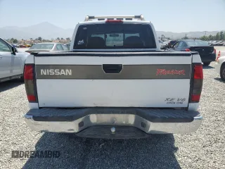 2000 Nissan Frontier XE with VIN 1N6ED27T8YC436513, listed as a Copart auction lot 60338695 with 307,757 mi miles and Clean title. Bid and sale history available at DreamBid. Image 6.