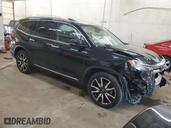2019 Honda Pilot Touring 7-Passenger with VIN 5FNYF6H65KB092806, listed as a Copart auction lot 54205085 with 130,219 mi miles and Salvage title. Bid and sale history available at DreamBid. Image 4.